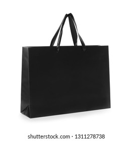 Paper shopping bag isolated on white. Mock up for design - Powered by Shutterstock