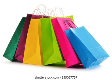 Paper shopping bags isolated on white background - Shutterstock ID 155057759