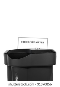 Paper Shredder Destroying Credit Card Offer