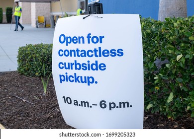 Paper Sign Announcing Curbside Pick Up Caused By Covid 19 Pandemic