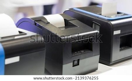 paper slip exit from thermal printer ; business background 