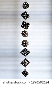 Paper Snowflakes Hanging On String At A Window In Winter