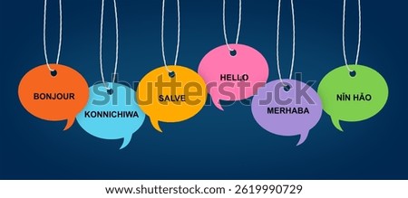 Paper speech bubbles with greetings in different languages hanging on dark blue background. Banner design