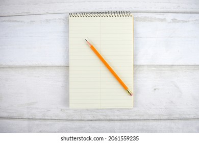 A Paper Steno Notebook with Sharpened Pencil