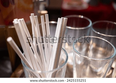 Paper straws made of eco friendly paper. Close up on white paper straws facing upwards. ecologically friendly yet durable paper drinking straws.