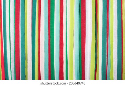 Paper Streamers Background In Christmas Colors, Reds And Greens 