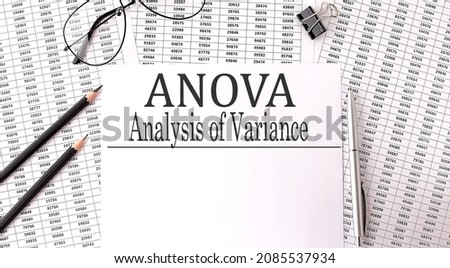 Paper with text ANOVA ANALYSIS OF VARIANCE on table chart