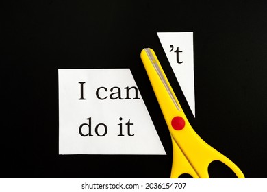 Paper With Text I Can't Do It (I Can Do It) And Scissors On Black Background