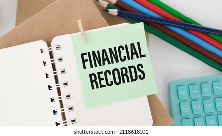 Paper With Text Financial Records On A Financial Tables With Calculator. Business Concept.