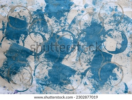 Paper texture with blue and brown spots and circles