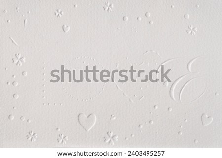 paper texture with embossed hearts and flowers