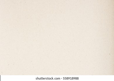 Paper texture light rough textured spotted blank copy space background in beige yellow