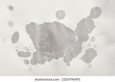 Paper texture with wet spots. Paper with water stains. Sheet of old paper with surface texture. Full frame