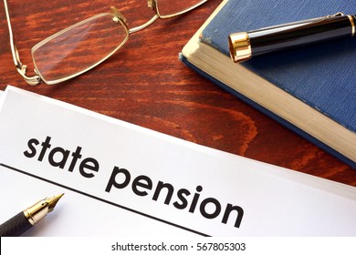 Paper With Title State Pension On A Table.