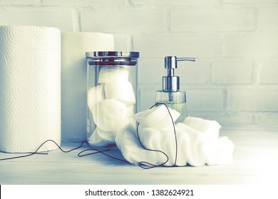 Paper towel, paper tissue, cosmetic product, cotton pads and cotton wool - hygienic disposable products - concept of body care and cosmetic products.  Copy space - Shutterstock ID 1382624921