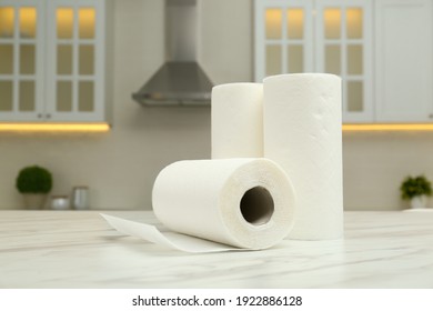 Paper towels on white marble table in kitchen