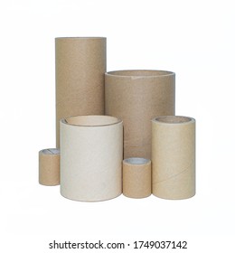 Paper tube cores, tissues isolated on white background, in industry manufacturing plant factory. Product material of brown paper rolls. Cardboard cylinder cargo in stock workshop storage warehouse.