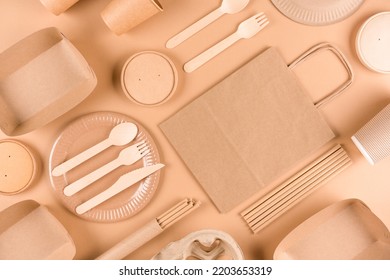 Paper Utensils And Wooden Cutlery Set Over Brown Background. Street Food Sustainable Paper Packaging, Green And Zero Waste Packaging Concept. Flat Lay Style