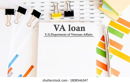 Paper With VA Loan On A Table