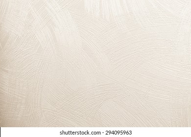 Paper wallpaper on the walls of  beige house with a scratch pattern. Abstract background, pastel cream colored vintage carpet, soft wrinkled pattern with golden faded lines on luxury bedroom in hotel. - Shutterstock ID 294095963