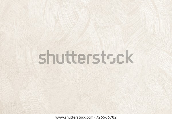 Paper wallpaper on the walls of  beige house with\
a scratch pattern. Abstract background, pastel cream colored\
vintage carpet, soft wrinkled pattern with golden faded lines on\
luxury bedroom in hotel.