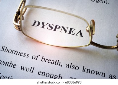 Paper With Word Dyspnea And Glasses.