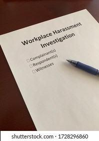 A Paper With The Words Workplace Harassment Investigation, Complainant, Respondent, And Witnesses On It.