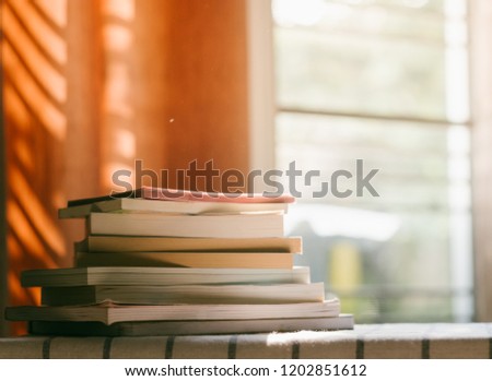 paperback books on a table