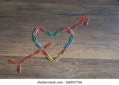 Paperclip, Heart Was Shooting By Arrows In The Middle.valentine; Romance; Love Story Concept.