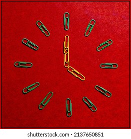 Paperclip Watch With A Red Face.  Abstract Paperclip Art.