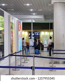 Paphos, Cyprus -12-09-2018: People Using Border Control Technology At The Airport. The Machines Have Facial Recognition, Having Passengers Face And Passport Scanned At A Kiosk