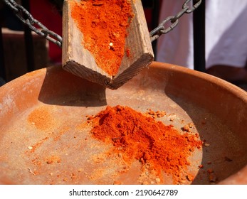 Paprika Spice Made From Dried, Smoked And Ground Red Peppers In The Ceramic Bowl At The Market Counter