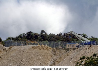 PAPUA NEW GUINEA - CIRCA 2015: Crane Parked On A Gas Drilling Pad In The Highlands Of Papua New Guinea