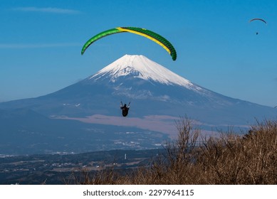 Para Gliders in front of Mount Fuji