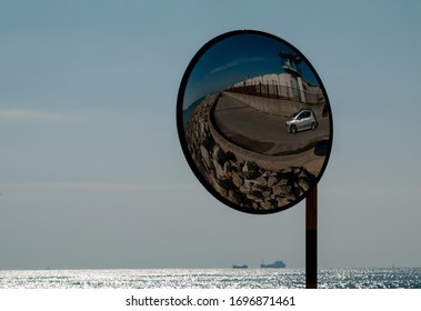 Parabolic Mirror On A Road For Traffic Safety.