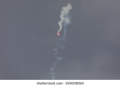 Parachute Distress Signal Rocket Falling Down.