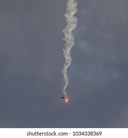 Parachute Distress Signal Rocket Falling Down.