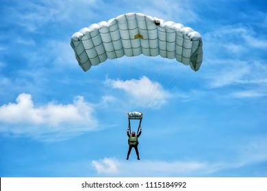 Parachute training with blue sky