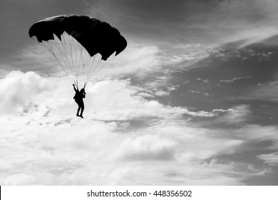 Parachuting in black and white