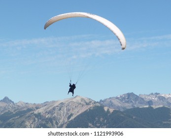 Parachuting over a mountain