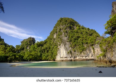 Paradise beach between cliffs