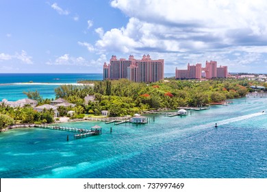 Paradise island with the Atlantis Resort at the background, Nassau, Bahamas
				Awesome Atlantis Resort on Paradise island in the island of Nassau, in the heart of the Caribbean sea in a sunny summer day.