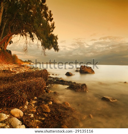 A paradise landscape in gold tones of coast Terens sea. Sicily island