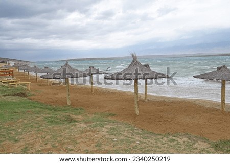 Paradise sand beach Ricina Vrsi, near city Zadar, Croatia, Dalmatia, Adriatic sea, bamboo umbrellas                                 Stock photo © 