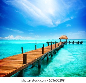 Paradise. Vacations And Tourism Concept. Tropical Resort. Jetty on Isla Mujeres, Mexico,Cancun - Powered by Shutterstock