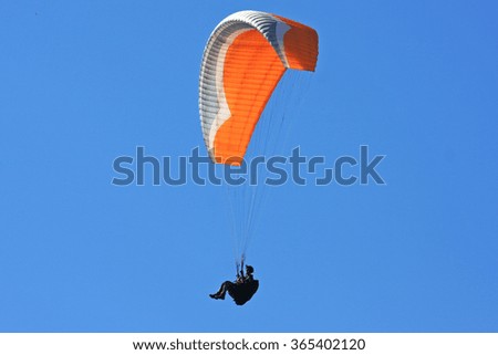 Similar – Image, Stock Photo A red kite flies as an octopus in the sky