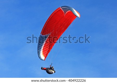 Similar – Image, Stock Photo A red kite flies as an octopus in the sky