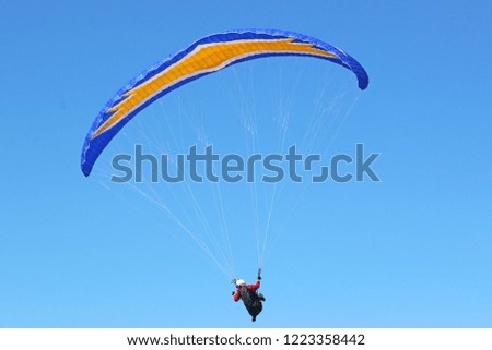 Similar – Image, Stock Photo Cool Move Kiting Ocean