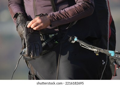 Paraglider Man Putting Gloves On