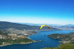 A Paraglider Over Lac D'Annecy Seen From Talloires-Montmin, France